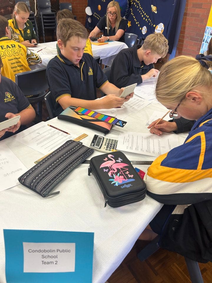 May be an image of studying and text